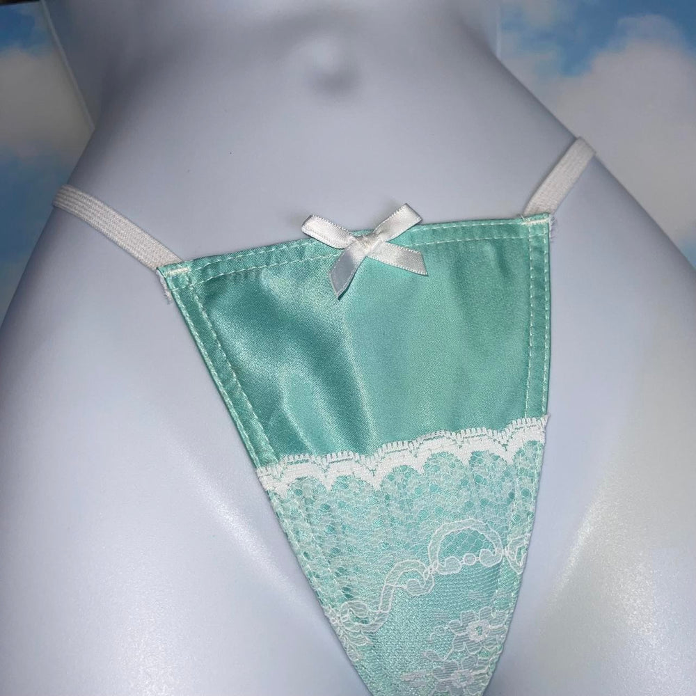 
                      
                        White Lace Trim Skimpy Shimmer G-String Thong Panty | Seafoam Satin
                      
                    