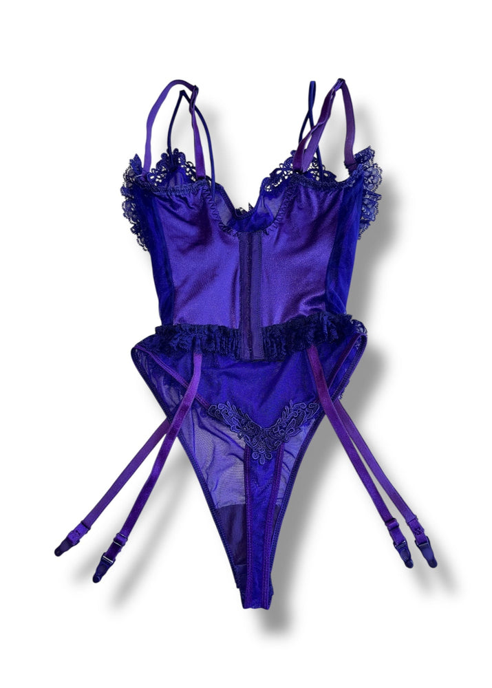 Purple lingerie set with lace details on a white background