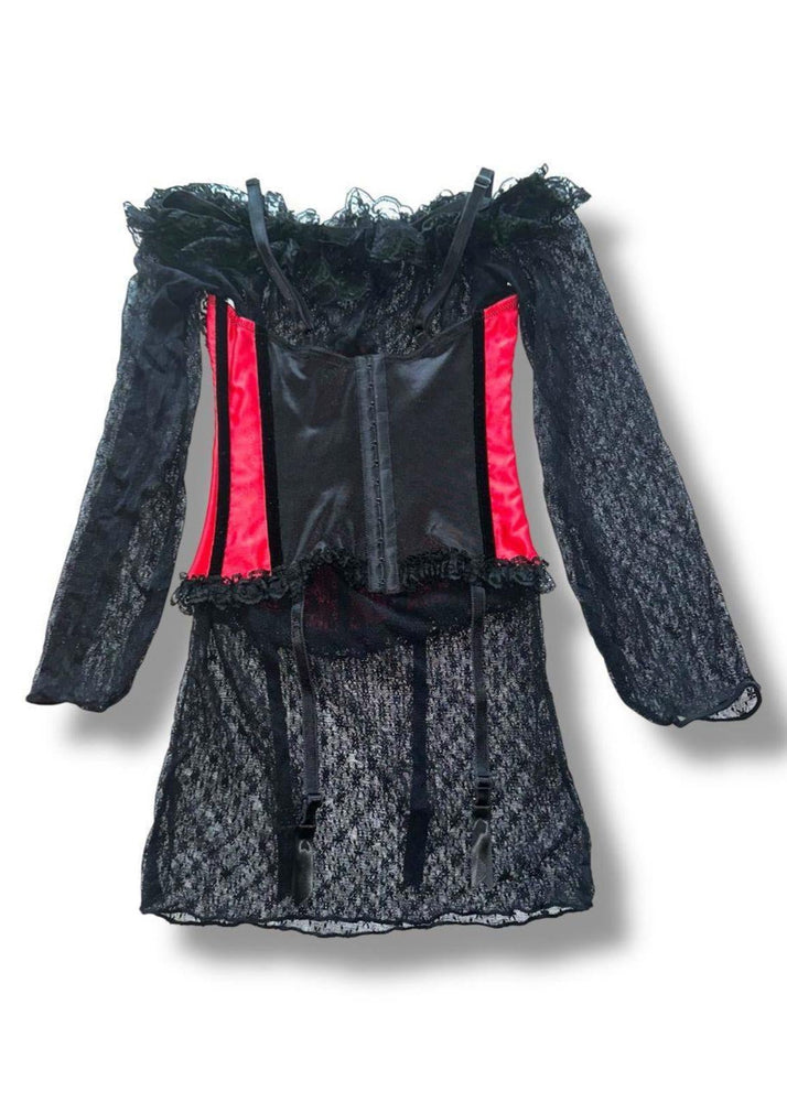 Black lace dress with red accents on a white background