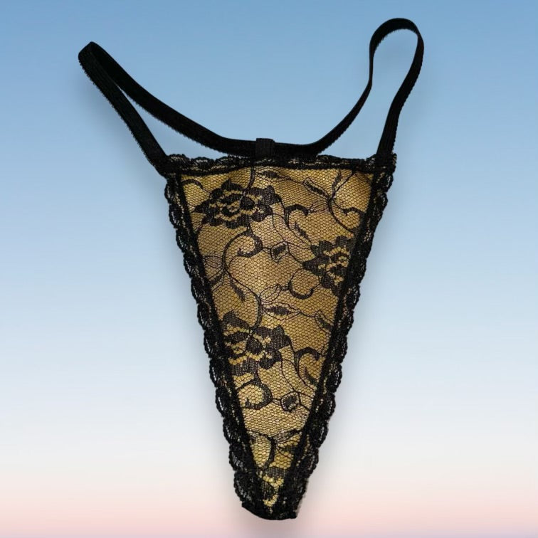 
                      
                        Sheer Lace overlay, Shimmer Satin Thong Panty | Black & Gold
                      
                    