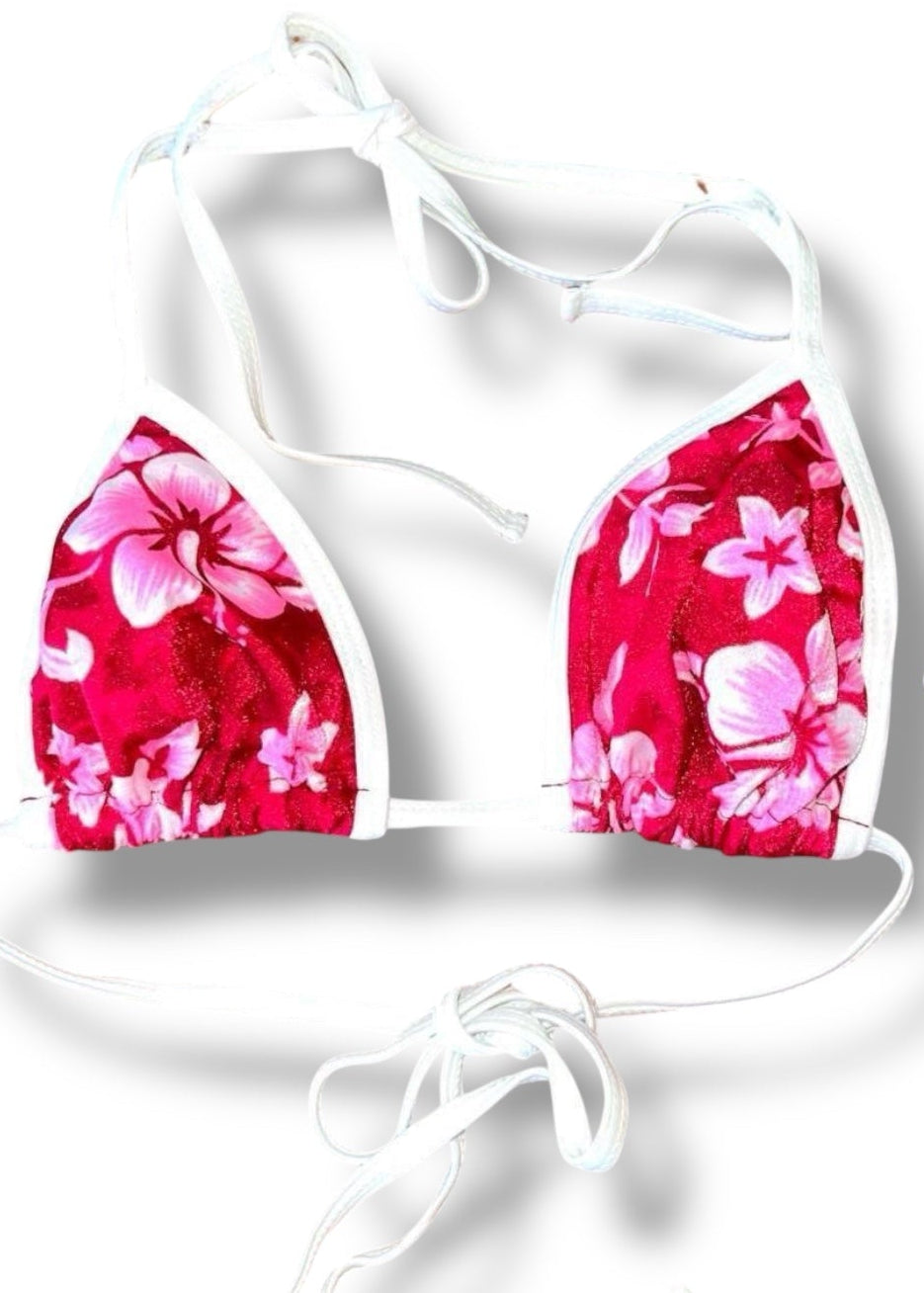Floral bikini top with a visible brand label on a white background