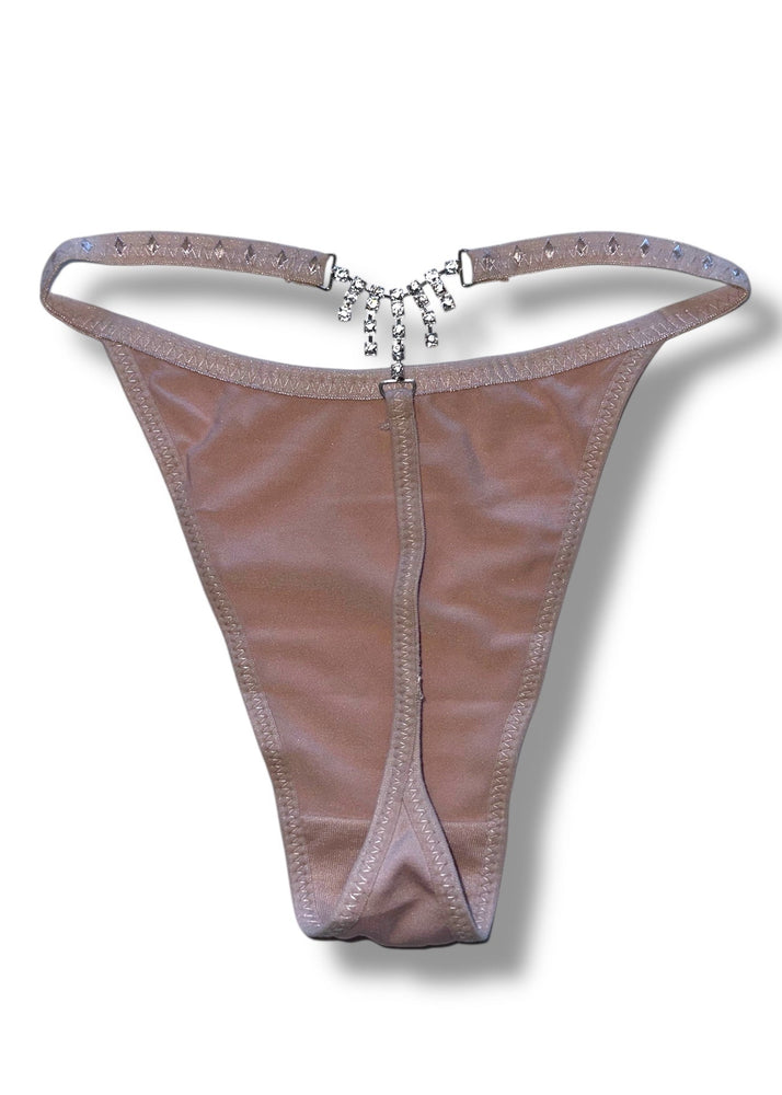 Brown thong with decorative chain on a white background