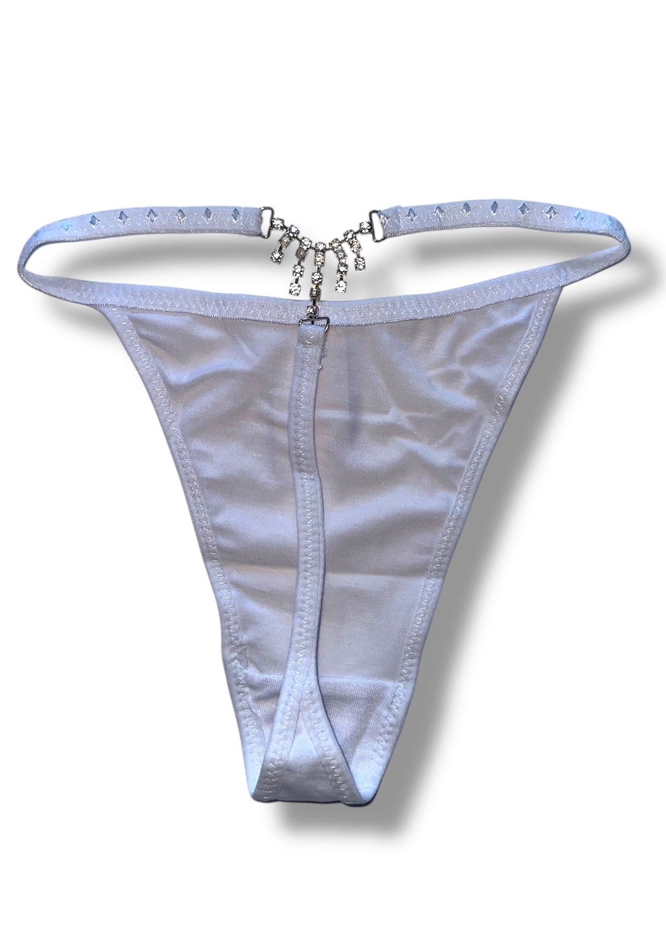 White thong with decorative chain on a white background