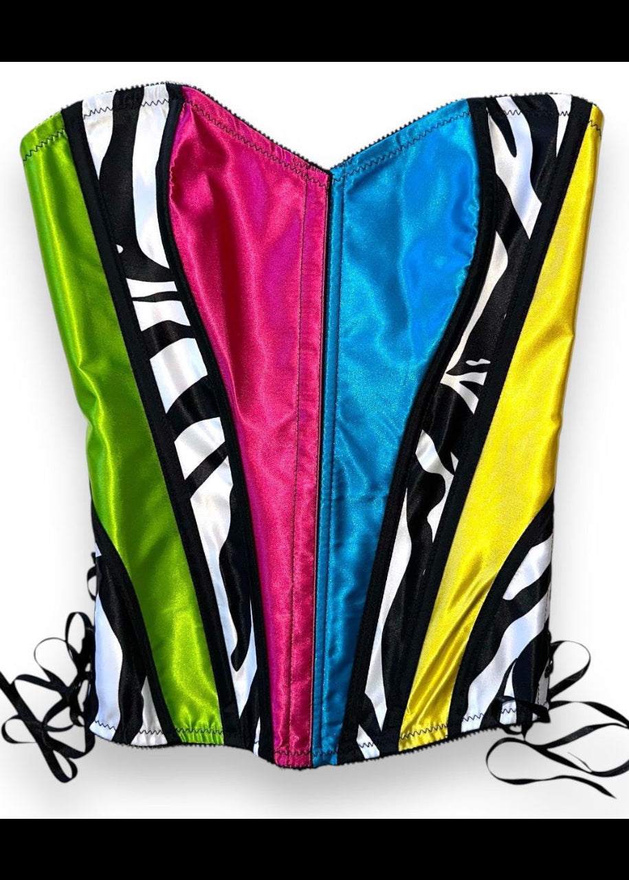 Colorful satin corset with zebra pattern on a white background