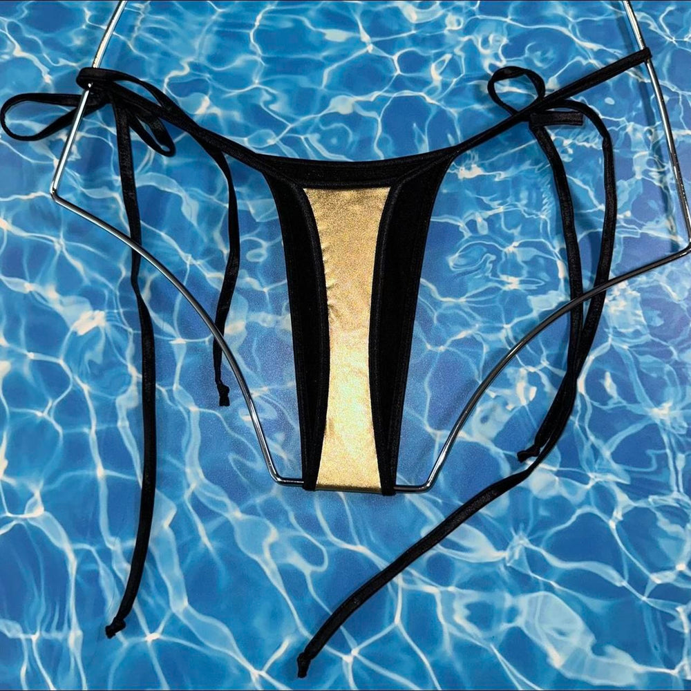 
                      
                        Y2K Ringer Tie Side Thong Bikini Bottom | Metallic Gold & Black
                      
                    