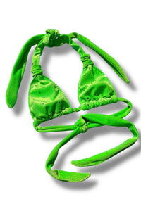 Green bikini set on a white background