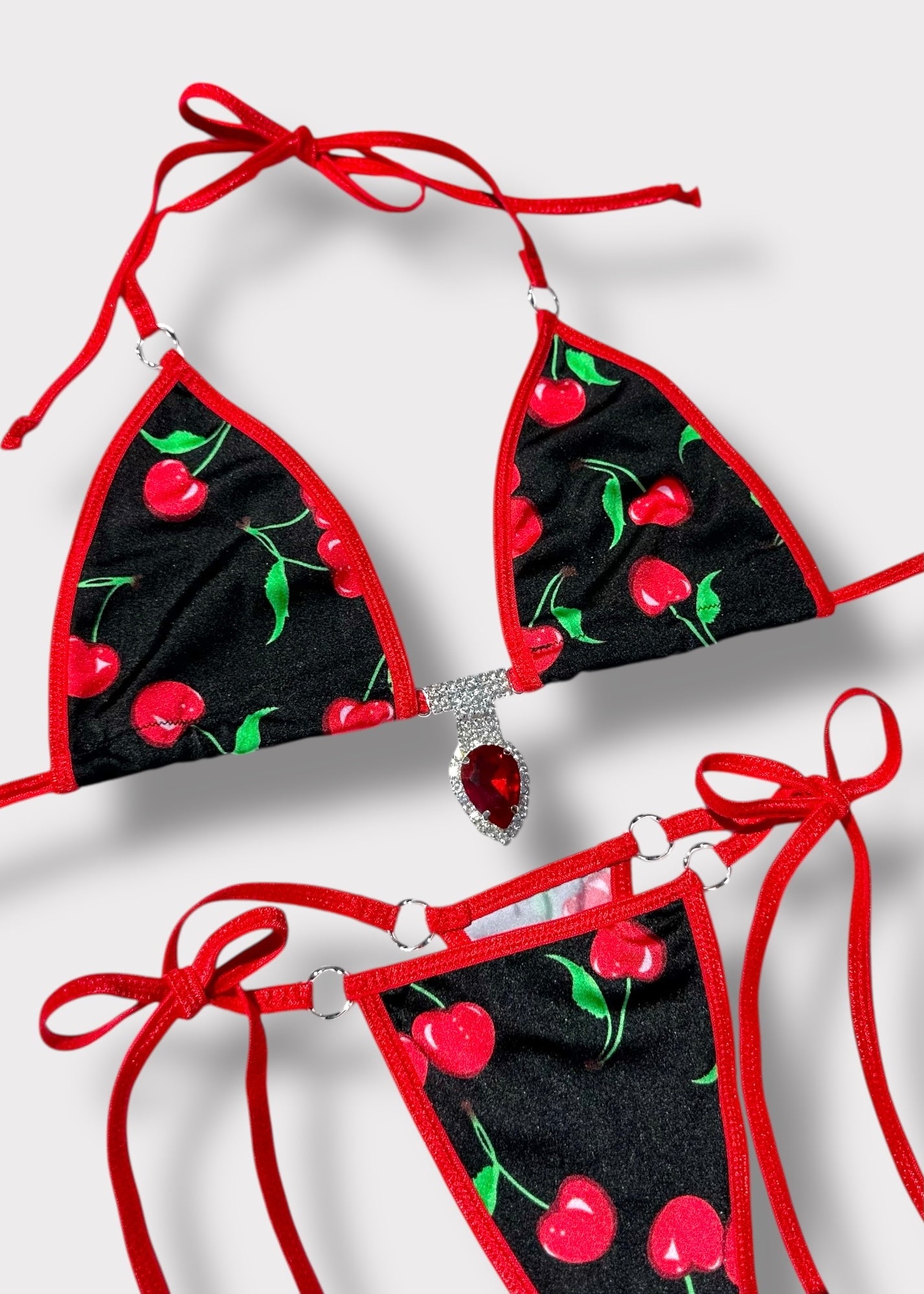 Black cherry print bikini with diamanté stones and red trim – festival-ready swimwear handmade in USA