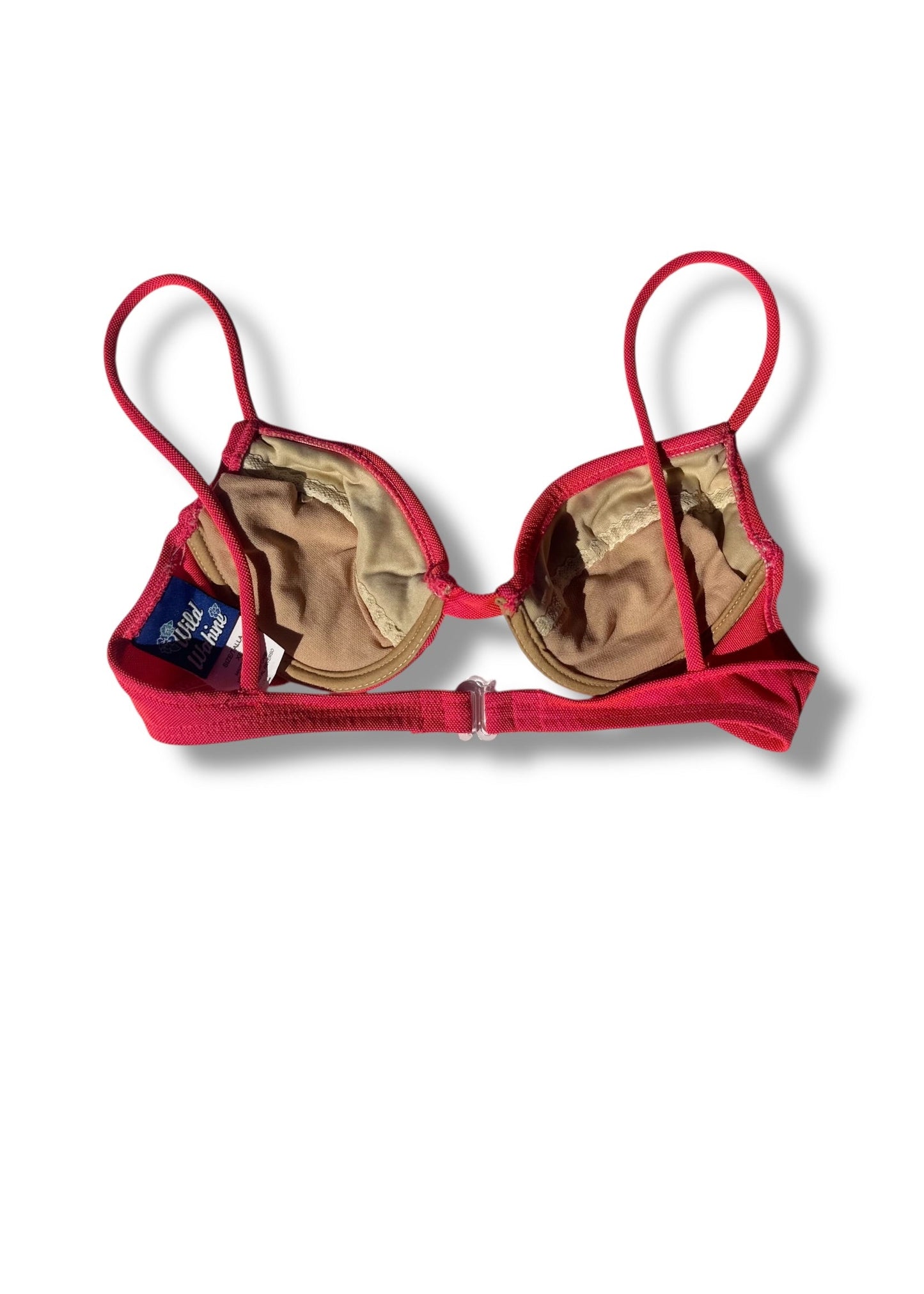 Red bikini top with gold interior on a white background