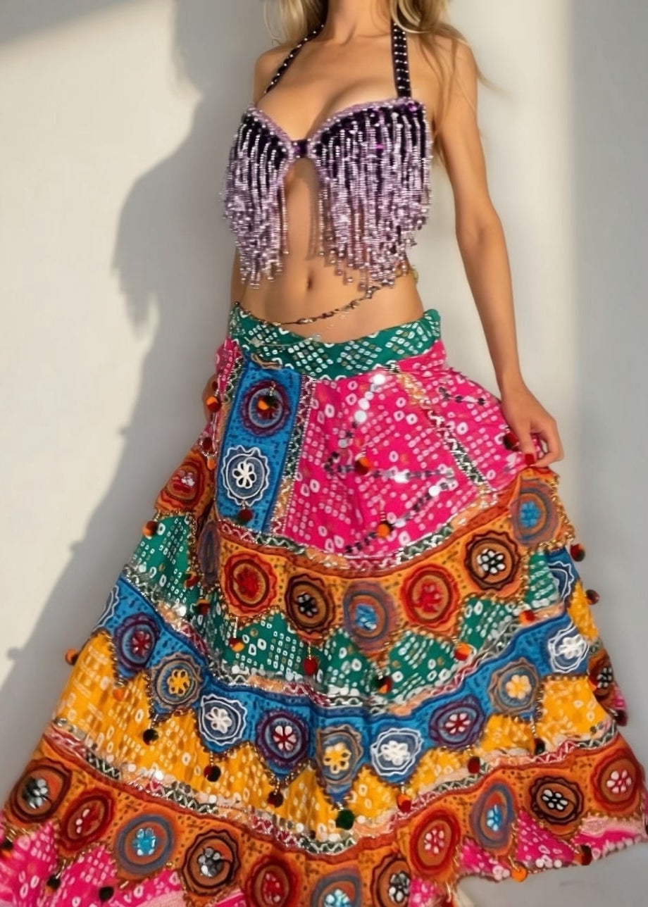 Colorful embroidered skirt with a plain background
