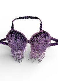 Purple bra with fringe details on a white background