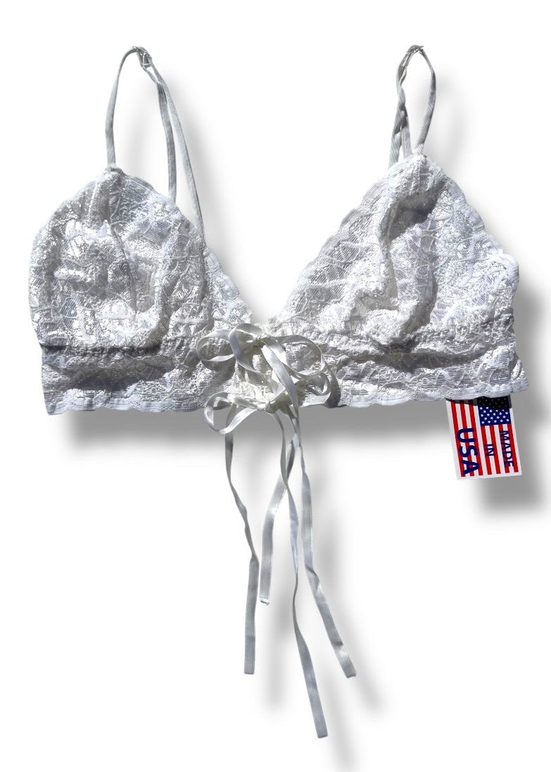Silver bikini top with a brand tag on a white background