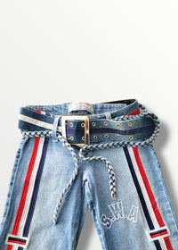 Light blue jeans with red and navy striped belt and 'S.W.A.' branding on a white background