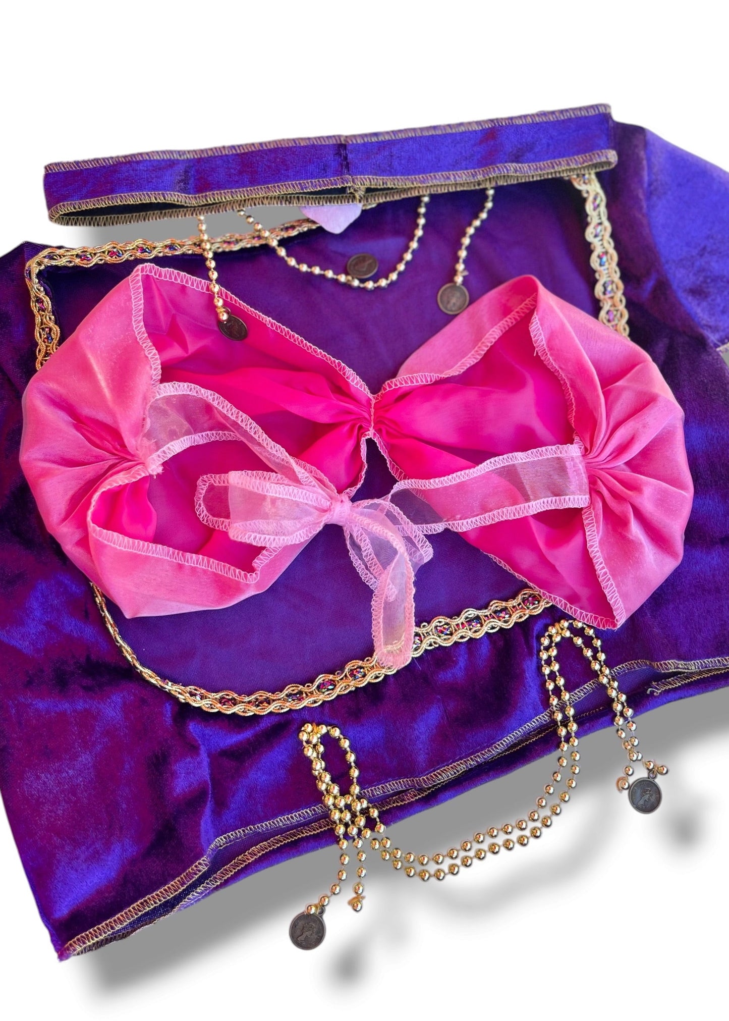 A purple and pink belly dance costume set with a purple skirt, pink bra top, gold beaded chains, and a matching purple headband, displayed on a white background with a drop shadow.