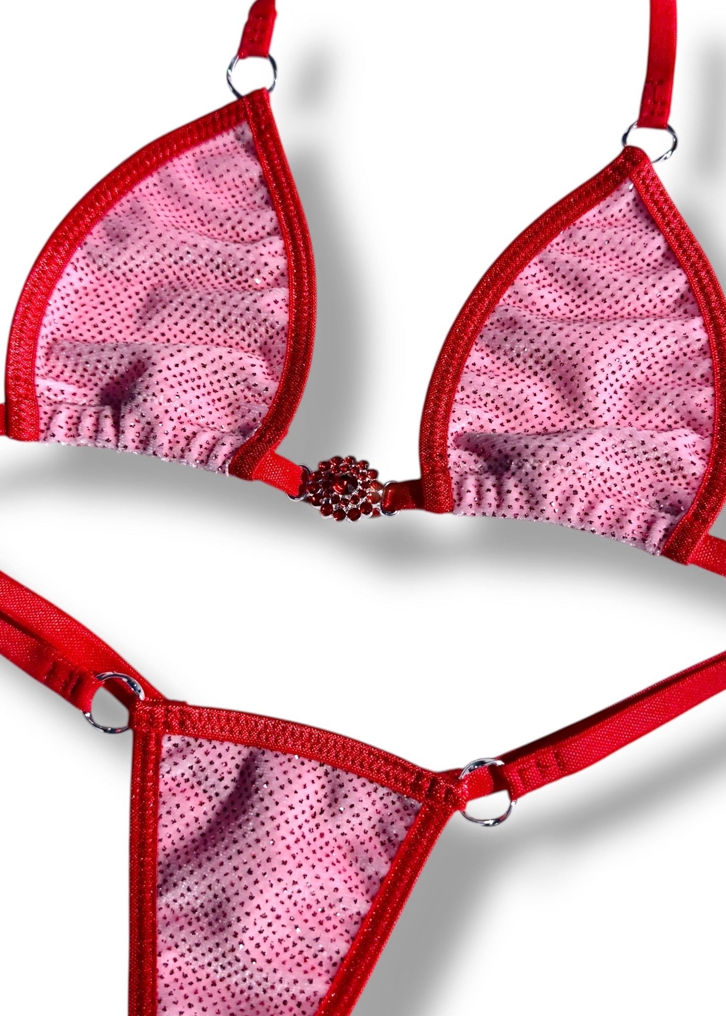 Red and pink bra and panties set on a white background