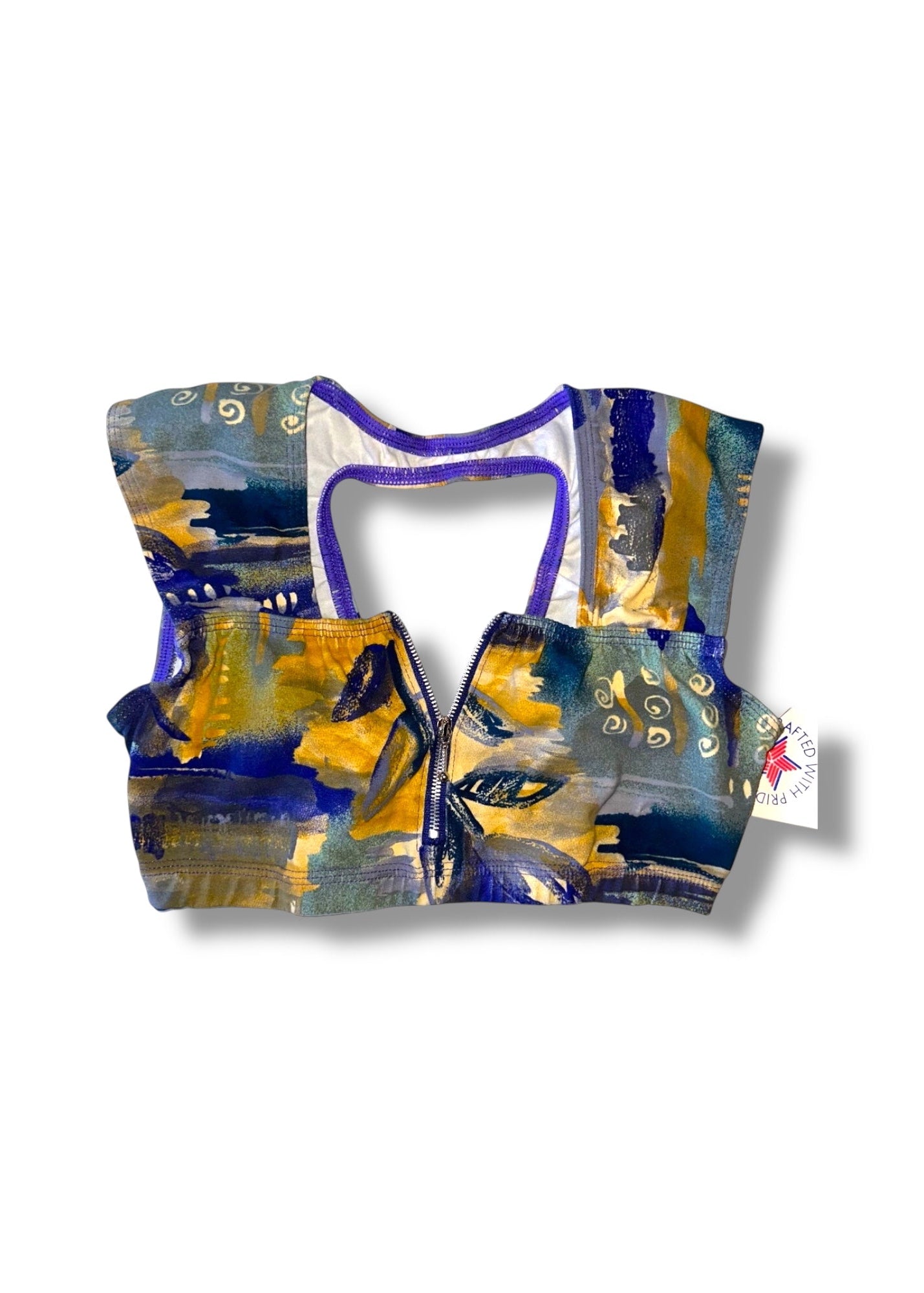 Colorful sports bra with abstract design on a white background