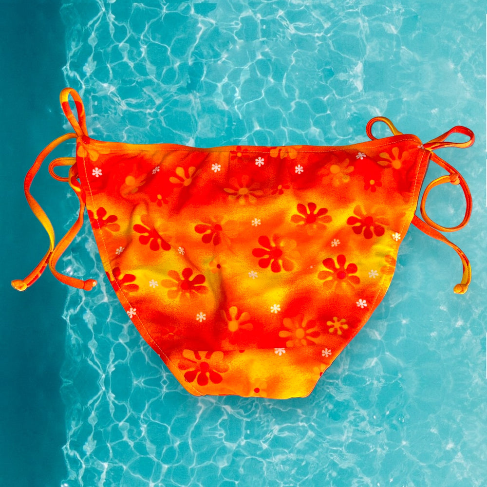 
                      
                        Y2K Tie Side Retro Swimsuit Bottom | Orange Crush
                      
                    