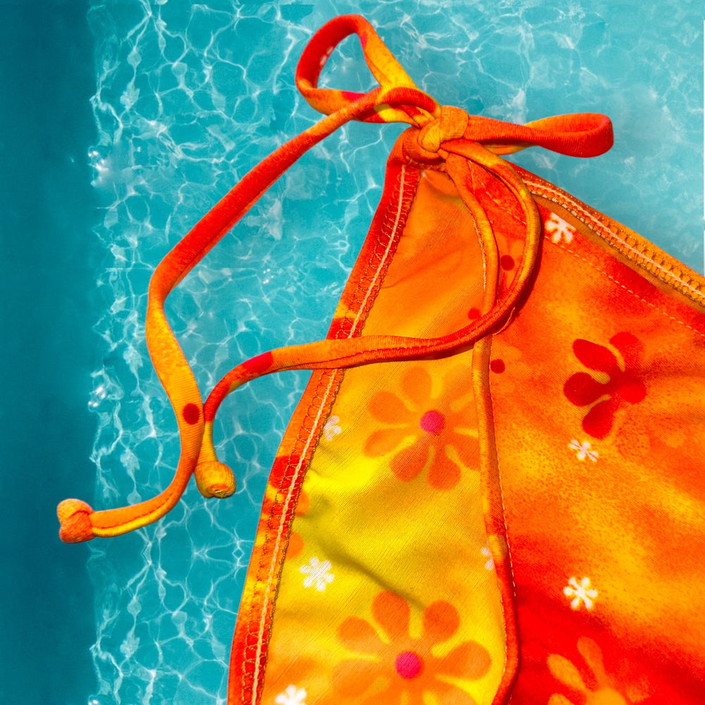 
                      
                        Y2K Tie Side Retro Swimsuit Bottom | Orange Crush
                      
                    