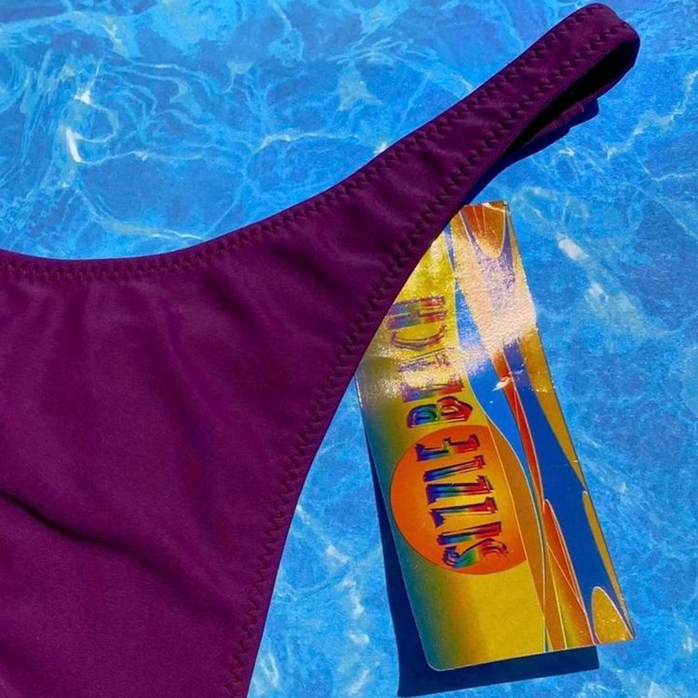 
                  
                    90’s Medium Thong Bikini Bottom | Plum
                  
                