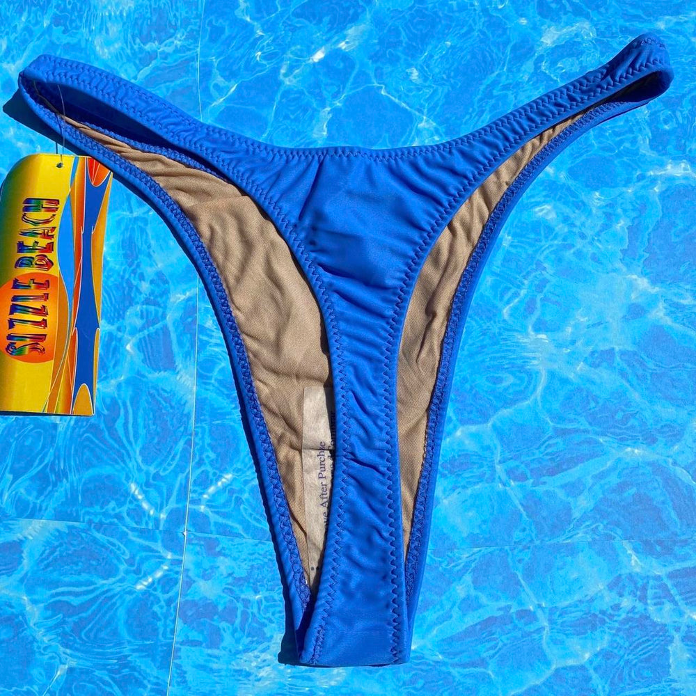 
                      
                        90’s Thong Bikini Bottom | Powder Blue
                      
                    