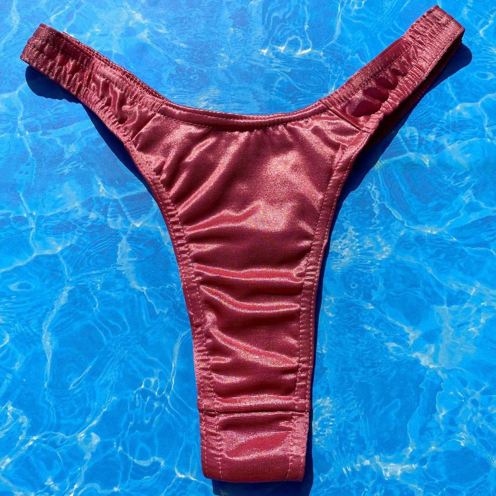 
                  
                    Satin Shimmer Ultra Flattering Thong Bikini Bottom | Rose
                  
                