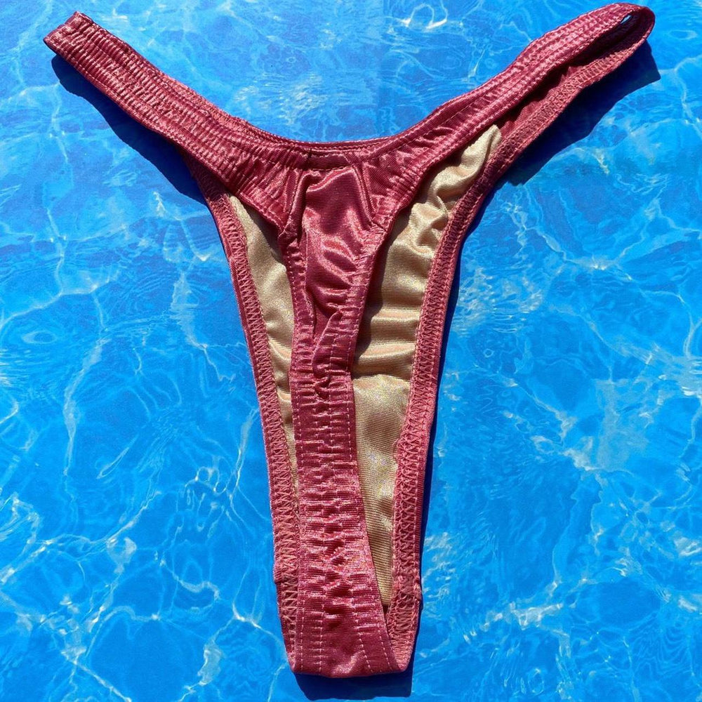 
                  
                    Satin Shimmer Ultra Flattering Thong Bikini Bottom | Rose
                  
                