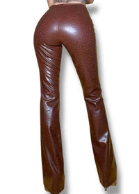 Brown leather pants on a white background